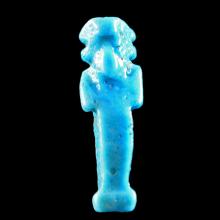Amulette momiforme en fritte bleue